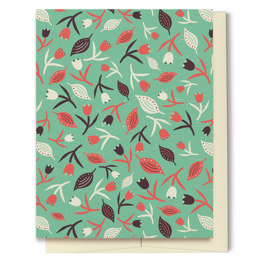 Tulips & Leaves Seafoam Green & Coral Blank Card features a pattern with tulips and leaves in shades of cream, orange and brown on a seafoam green background. The pattern extends over the back of the card too. 