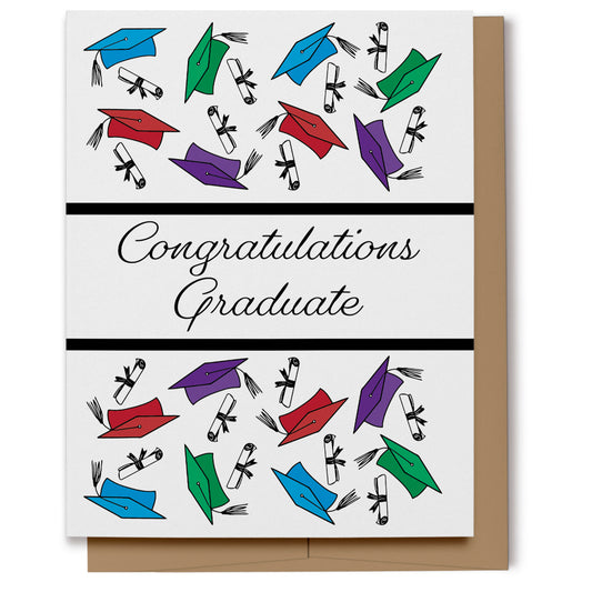 Congratulations Graduate card featuring hand drawn blue, green, red and purple graduation hats and diplomas flying in the air with script text which reads, "Congratulations Graduate".