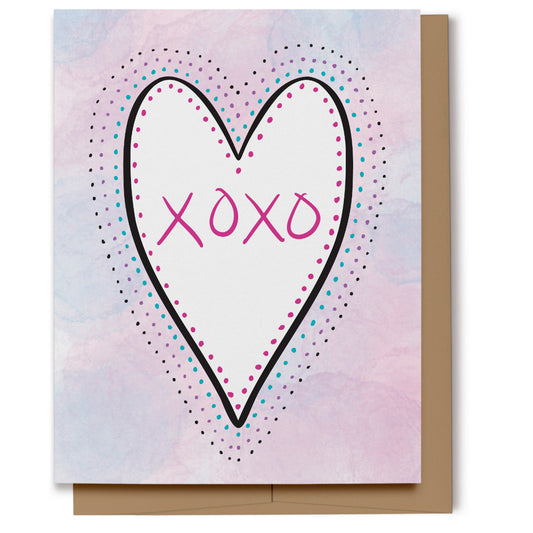 Love card featuring a white heart with hand lettered XOXO outlined with polka dots on a pink, purple and blue watercolor background.